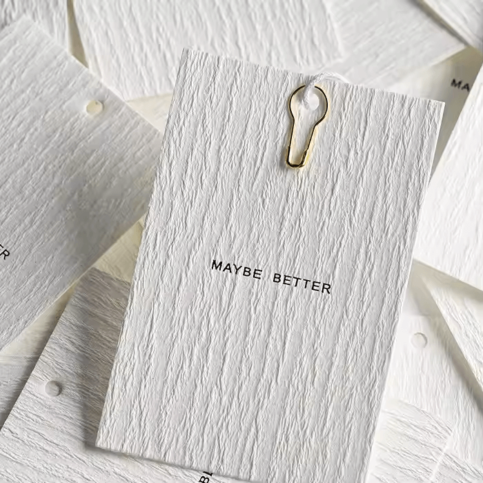 inside clothing tags vs hangtags​