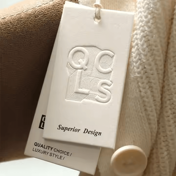 whte embossed hang tags​